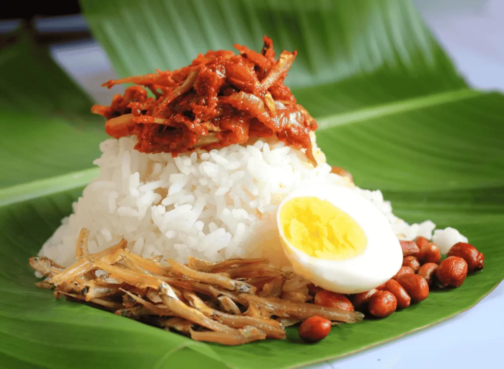 Nasi Lemak wrapped in banana leaf (Photo courtesy of Delish Global)