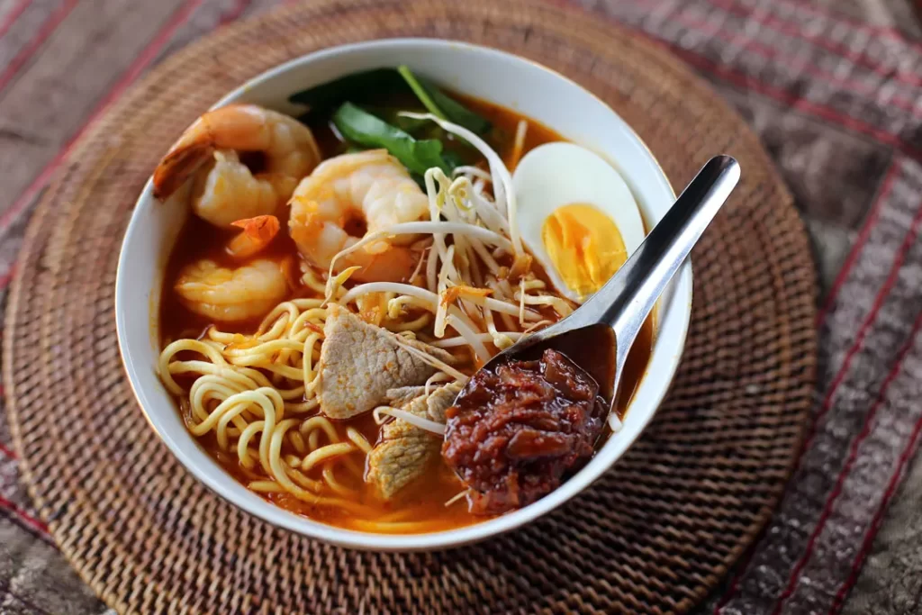 Penang Hokkien Mee: A prawny flavor packed spicy noodle soup broth that's umami & satisfying